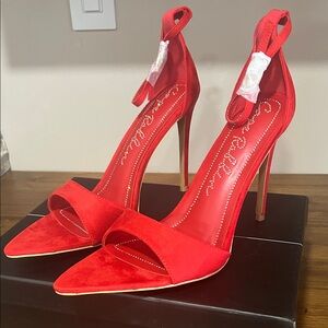 Sexy Red Stiletto Grazia Cape Robbin heels. New in box size 7